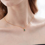 STMG Green Emerald Rectangle Necklace on neck