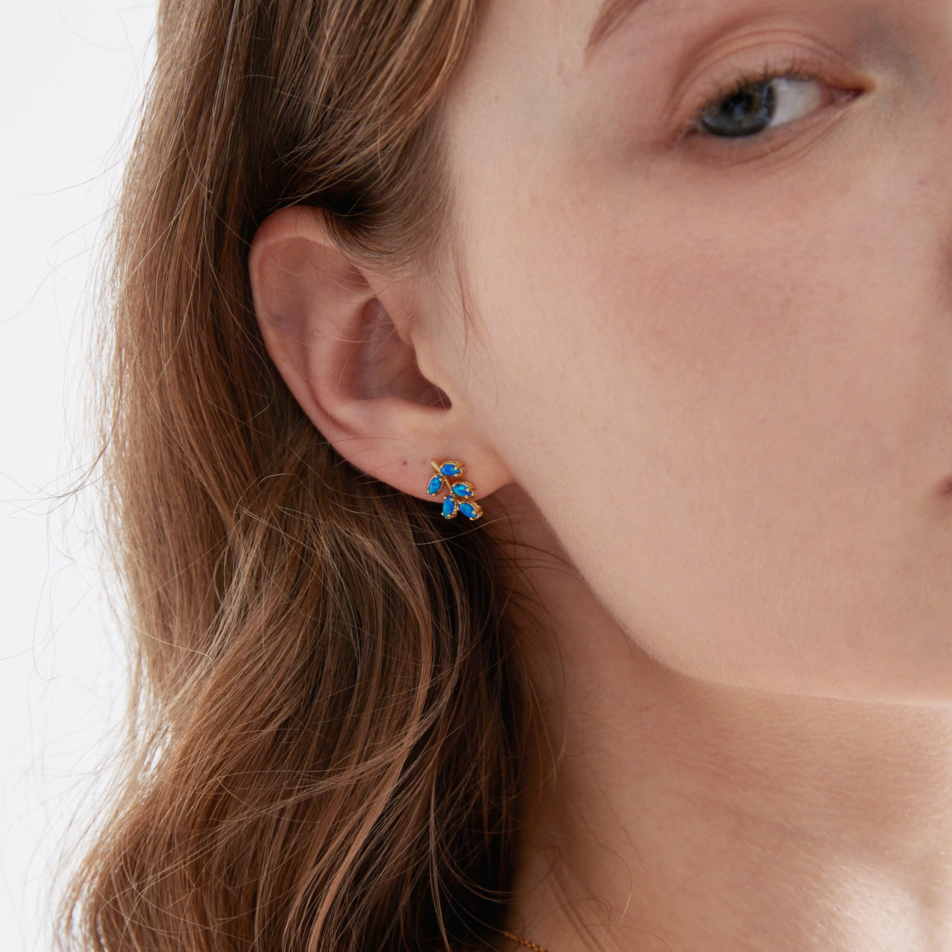 Blue Opal Olive Leaf Stud Earrings on ear