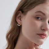 STMG Pearls Wreath Stud Earrings on ear