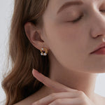 STMG Pearls Wreath Stud Earrings on ear