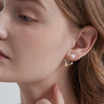 STMG Natural Pearls with CZ Stars Dangle Earrings on ear