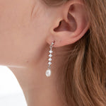 STMG Freshwater Pearl Drop Earrings in silver on ear