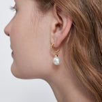 STMG Pearl Dangle Earrings on ear