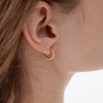 STMG Pearl Crystal Hoops in gold on ear