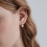 Droplet Pearl Stud Earrings on ear