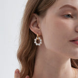 STMG Pearl Wreath Dangle Hoops on ear