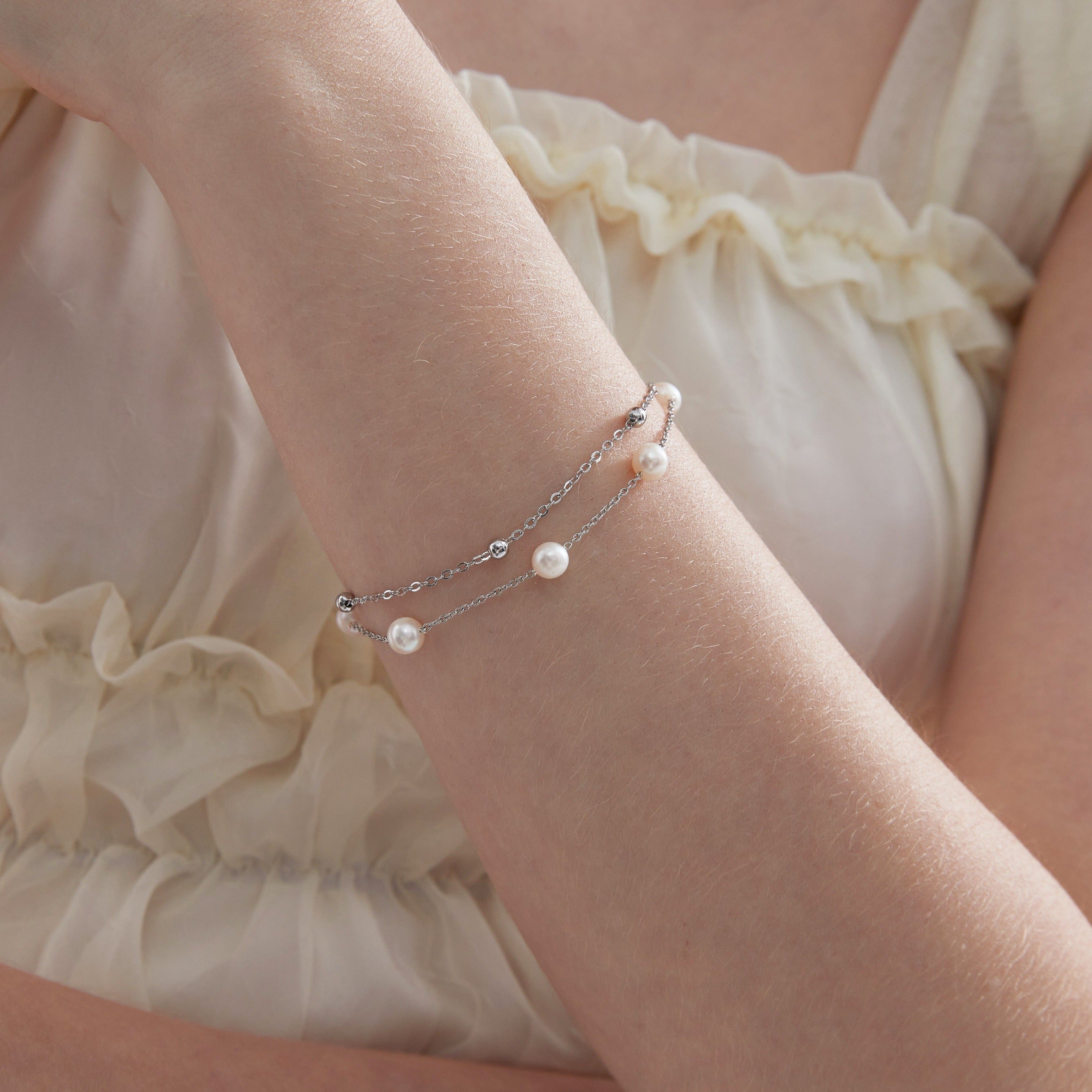 Duo Layer Natural Pearl Bracelet in silver on hand