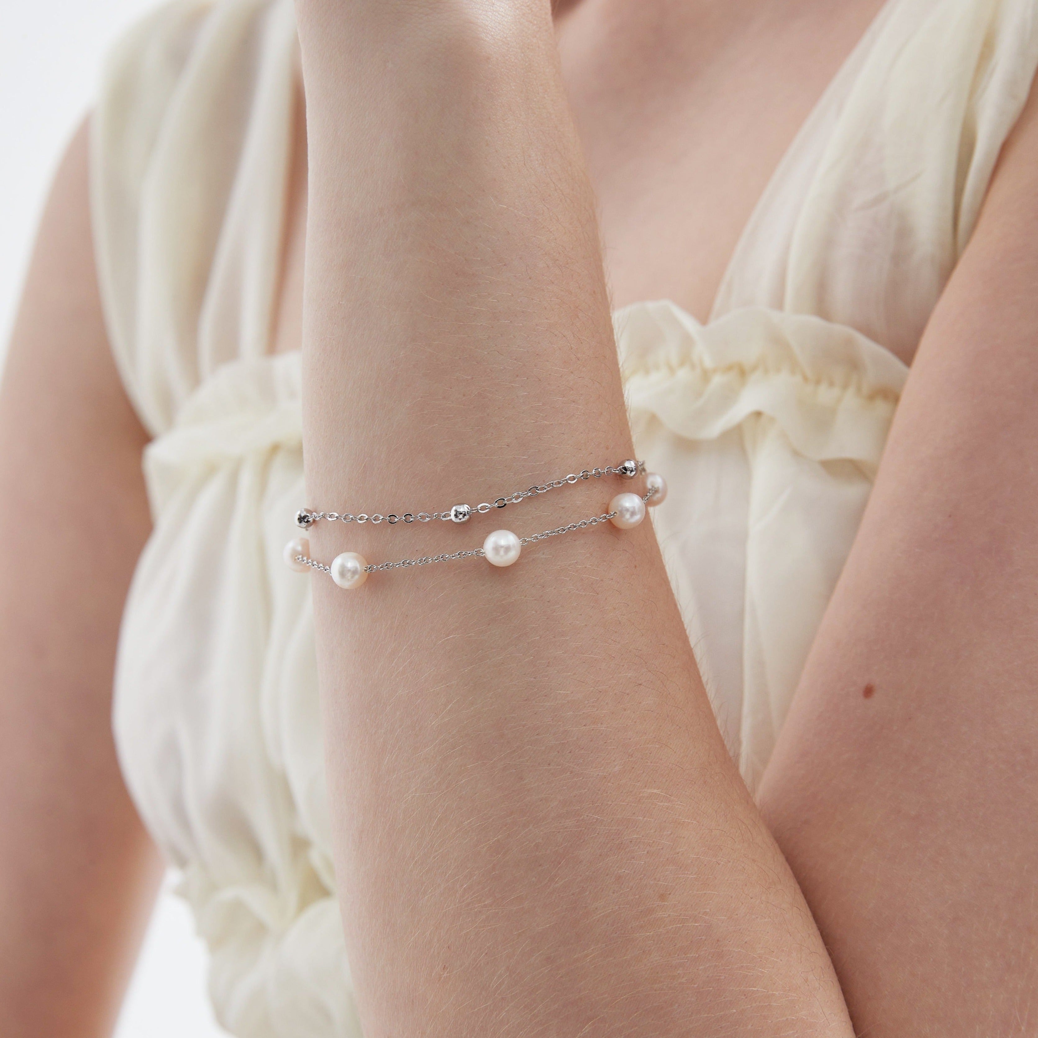 Duo Layer Natural Pearl Bracelet in silver on hand