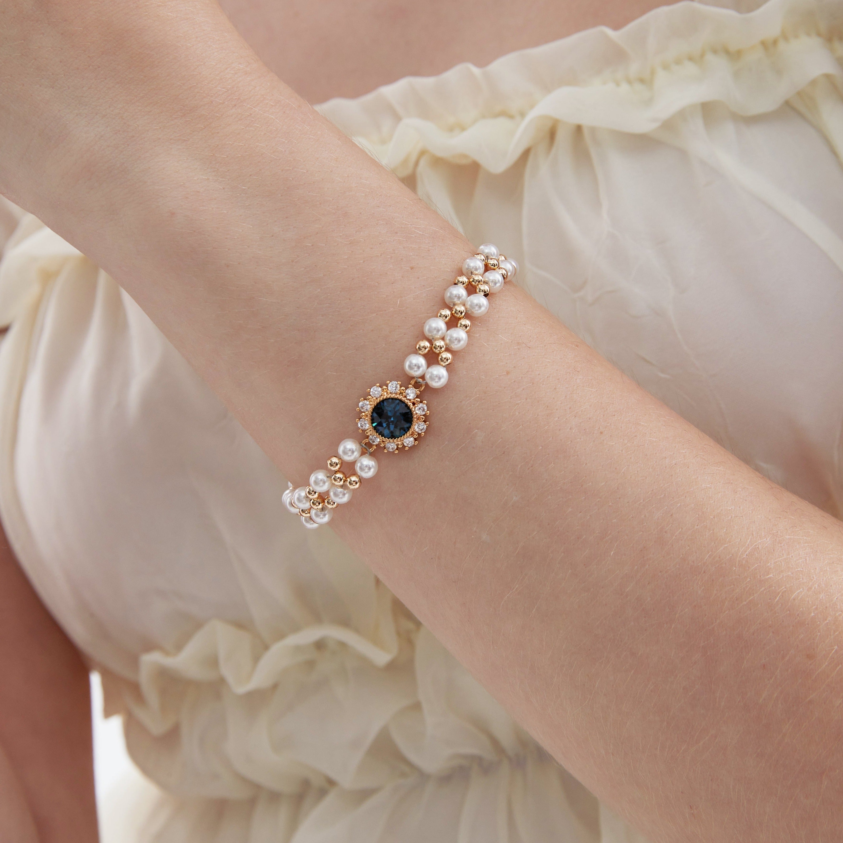 STMG Pearl with Sapphire Bracelet on hand