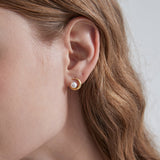 STMG Natural Pearl on Moon Stud Earrings on ear