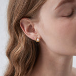 STMG Natural Pearl on Moon Stud Earrings on ear