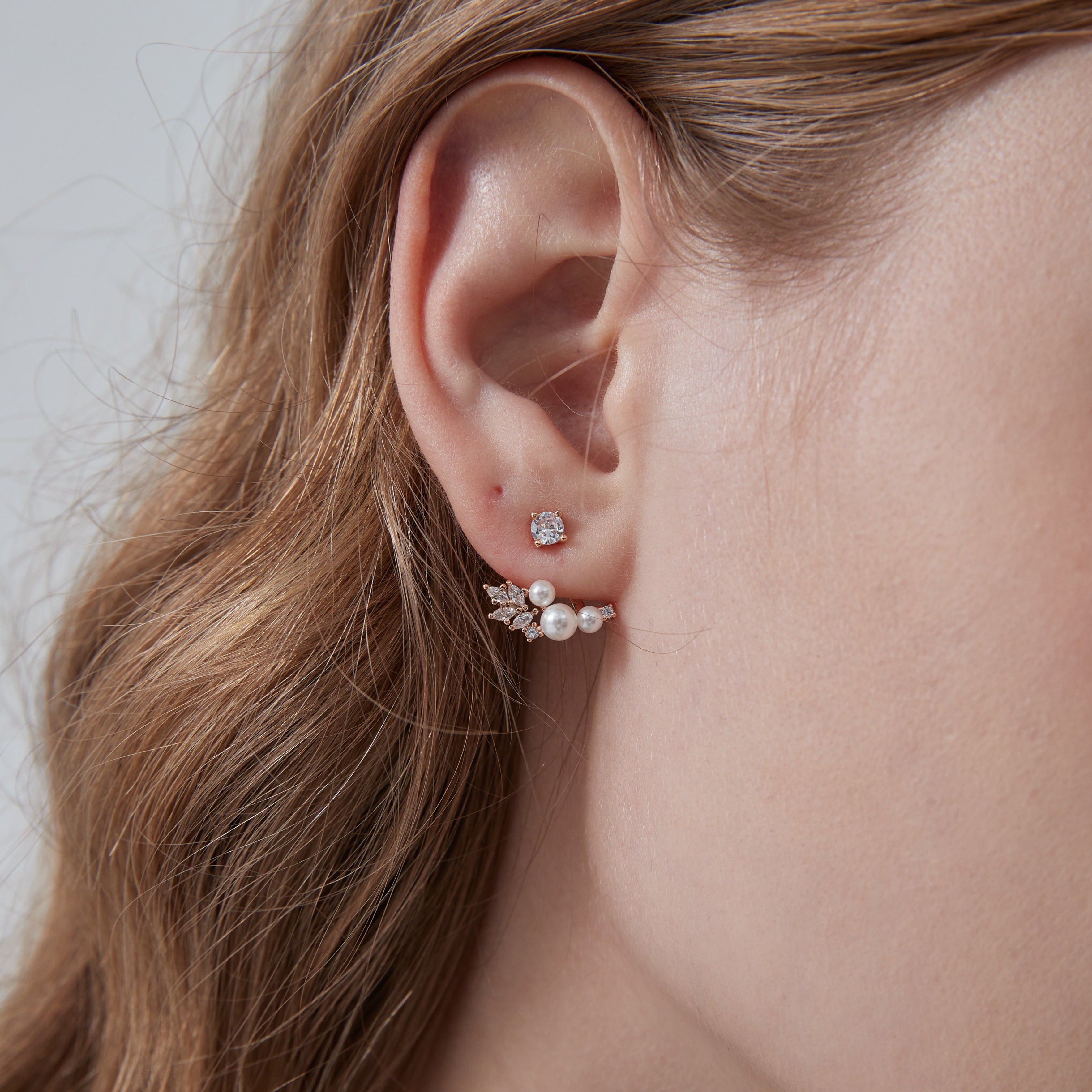 STMG Pearl Stud Earrings on ear