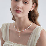 STMG Natural Pearl with Mother of Pearl Flower Necklace on neck with matching earrings on ear