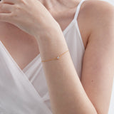 STMG Minimalist CZ Diamond Bracelet in gold on hand