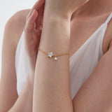 STMG Star with Pearl Bracelet on hand