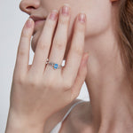 Blue Topaz on Olive Leaf Ring in silver on hand