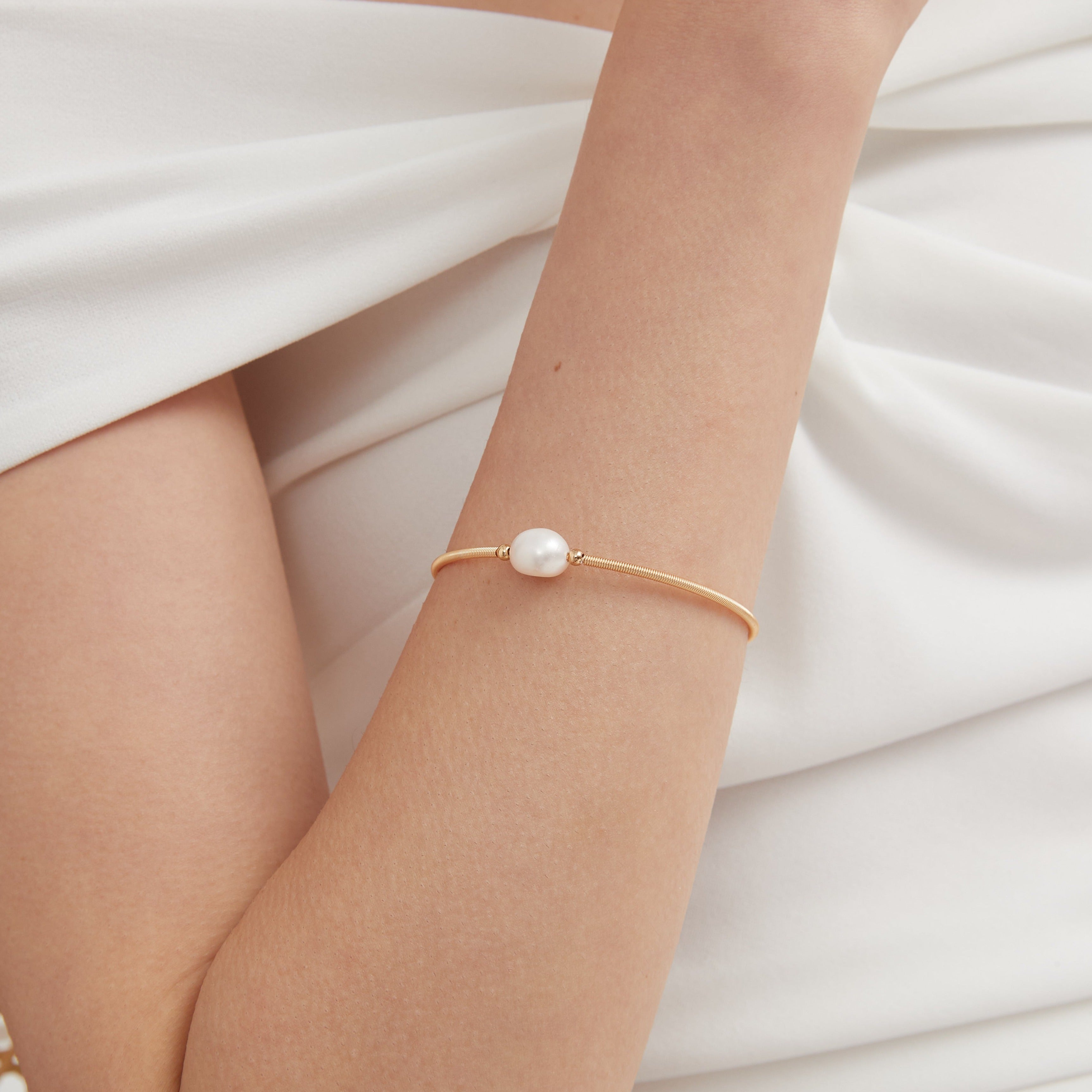 STMG Single Natural Pearl Bracelet on hand