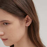 STMG Olive Leaf Stud Earrings on ear