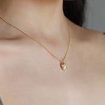 STMG Natural Pearl Necklace in gold on neck