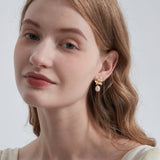 STMG Natural Baroque Pearl Flower Dangle Earrings on ear