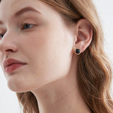 STMG Natural Black Agate Stud Earrings on ear