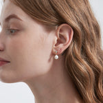 STMG Natural Pearl Dangle Earrings on ear