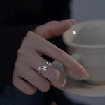 STMG Sparkly Flower Adjustable Ring on finger